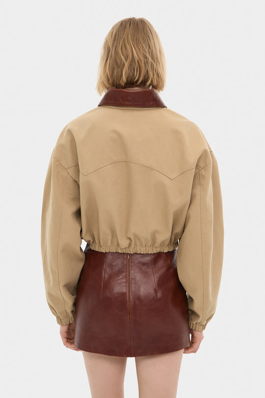 ADEL CROPPED COTTON BOMBER JACKET WITH DETACHABLE LEATHER COLLAR IN SAND