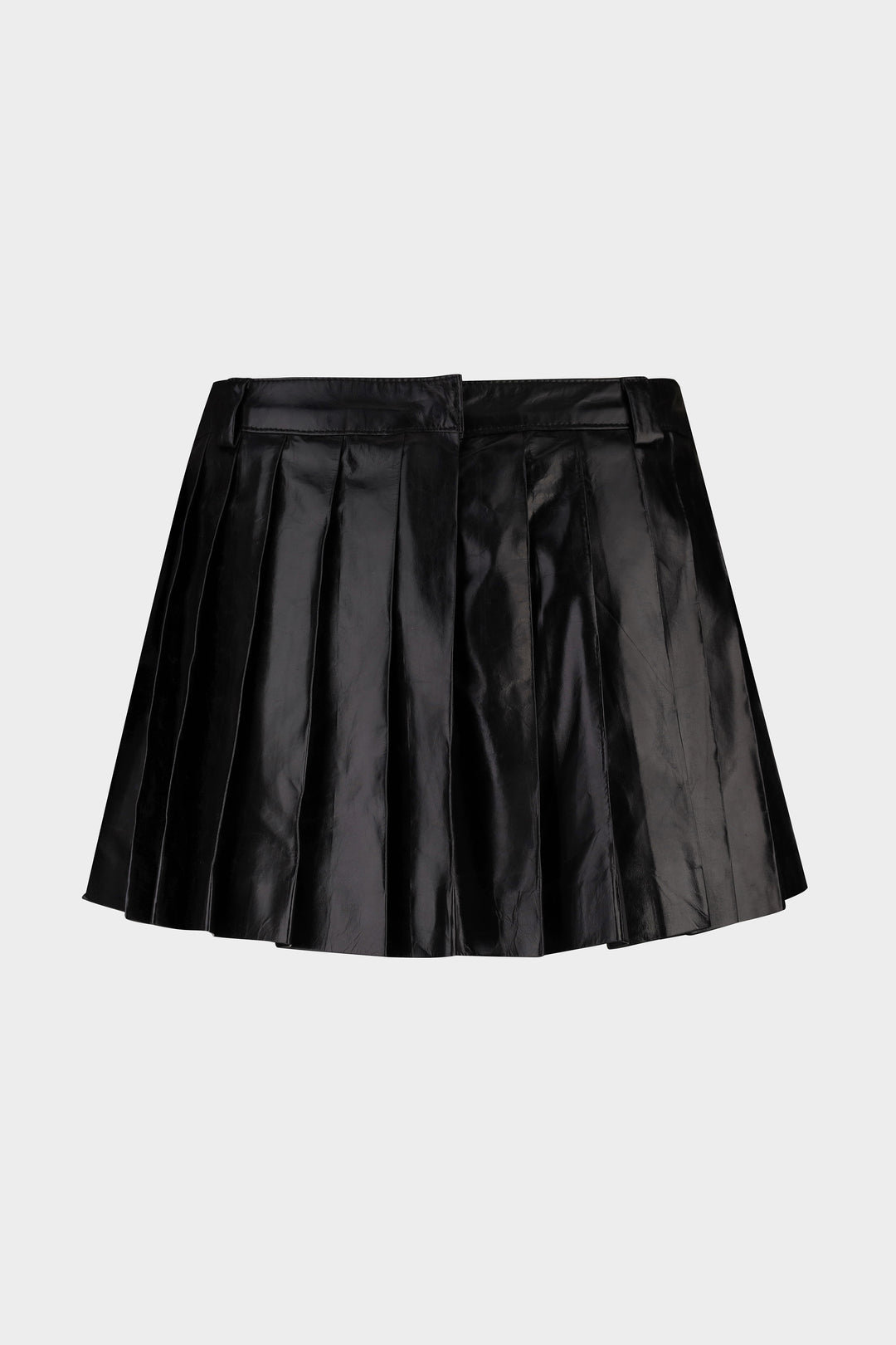 TRIXIE PLEATED LEATHER MINI SKIRT IN VOID BLACK