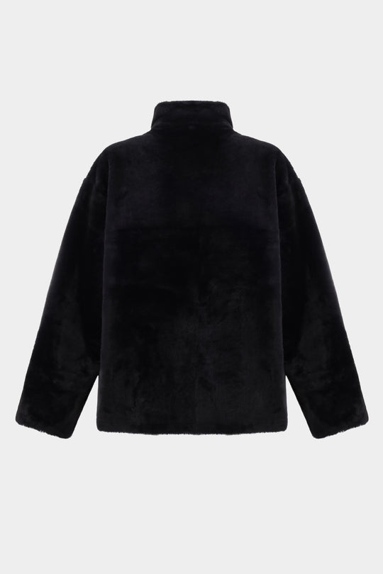 SILKY ELONGATED SHEARLING BOMBER JACKET IN BLACK