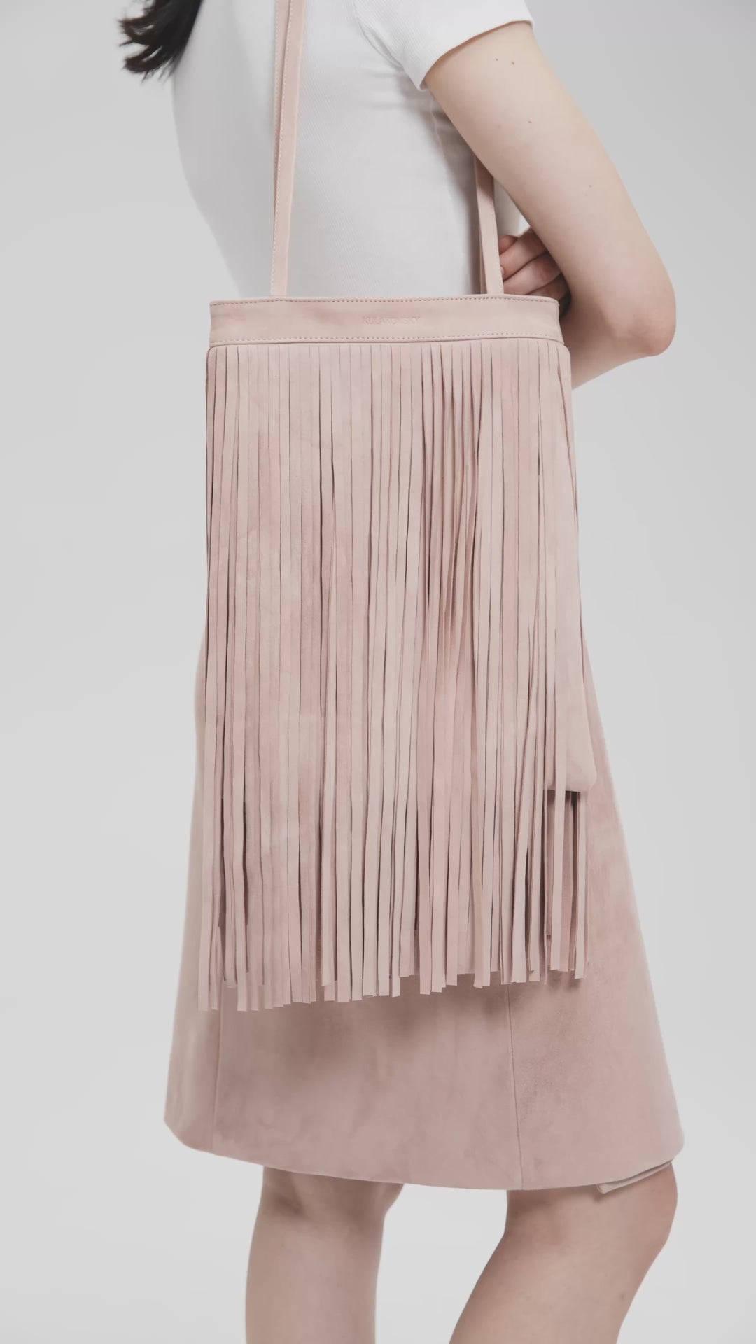 FANNIE FRINGED SUEDE BAG IN DUST PINK