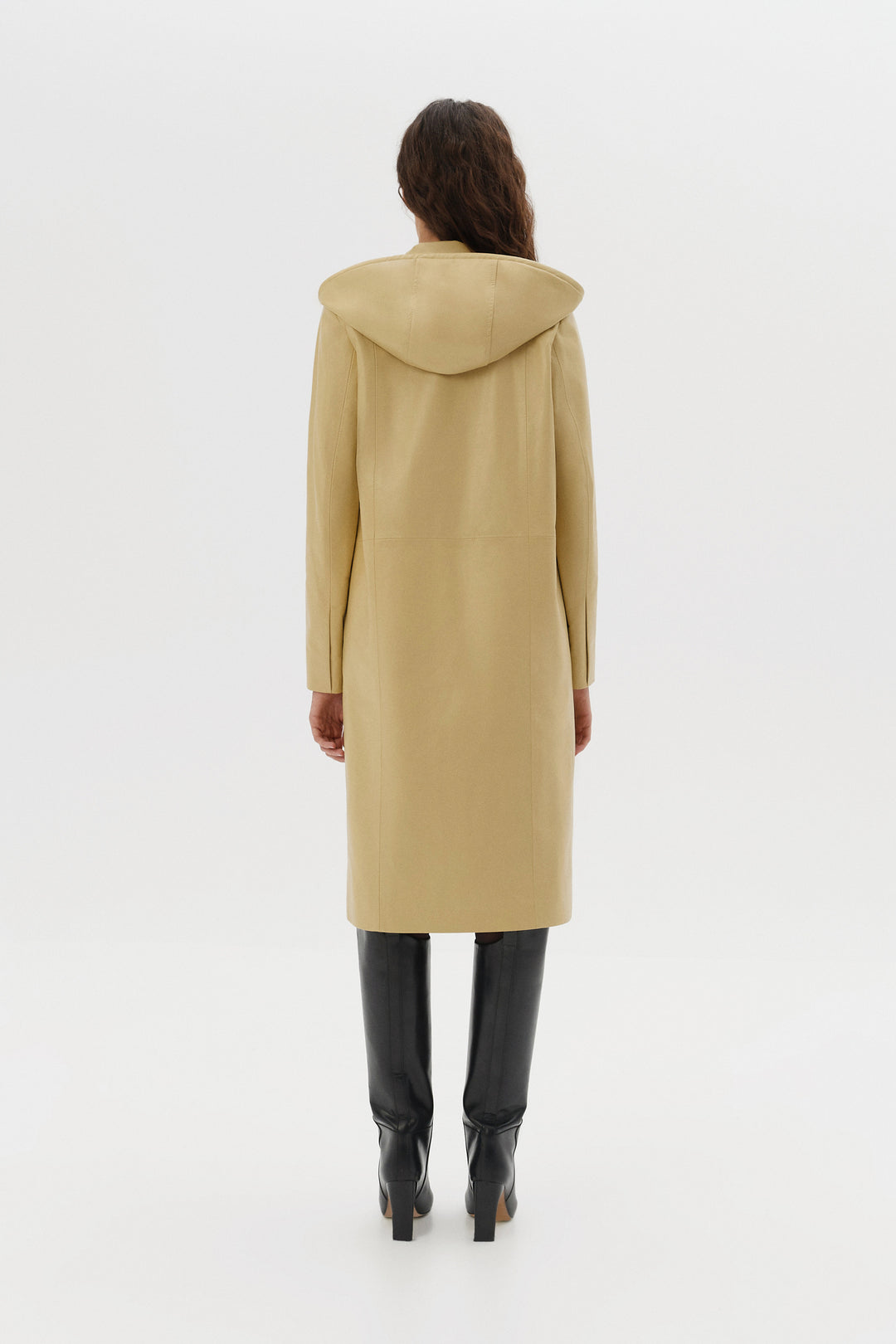Straight-cut leather coat with removable hood.